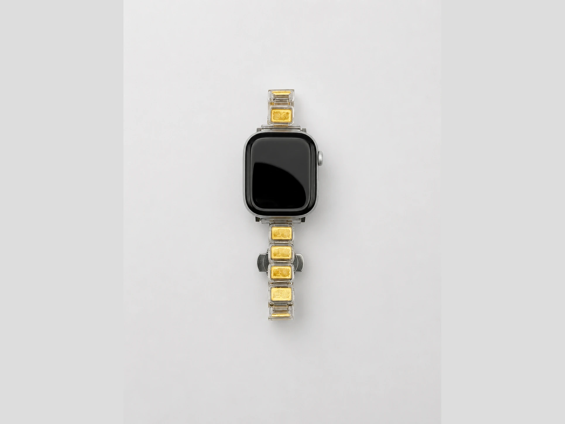 The strap on an Apple Watch, plain bars seated in each capsule